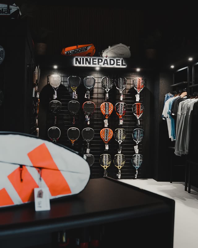 Padel racket wall in the club shop